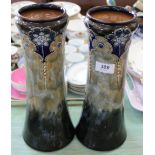 A pair of Royal Doulton stoneware floral vases (one as found)