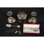 Mixed silver items to include a pair of squat candlesticks, a sterling dressing table jar,