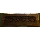 A carved wood panel, Procession of Elephants,