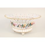 A Dresden lattice bowl with floral decoration and encrustations,