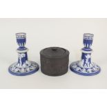 A pair of Wedgwood Jasper ware candlesticks (one as found) plus a Basalt preserve pot