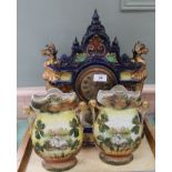 A Victorian pottery clock plus swan decorated vases (as found)