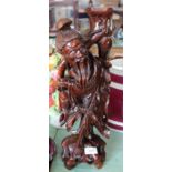 A Chinese hardwood carved table lamp of a fisherman,