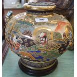 A Satsuma pot pourri with figure and grim faced immortal decoration,