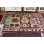 A Caucasian rug with multiple medallions,