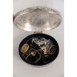 A white metal jewellery box with costume jewellery, contents including brooches, earrings,