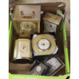 A box of various clocks