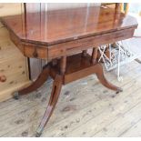 A William IV inlaid mahogany games table on brass casters