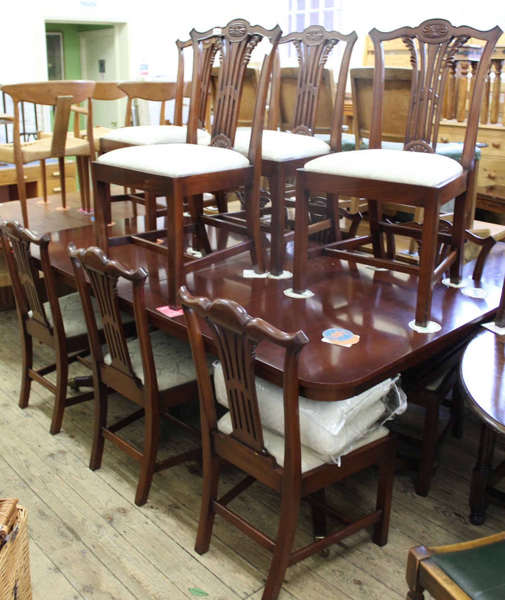 A good quality reproduction mahogany twin pedestal extending boardroom/dining table by Bevan