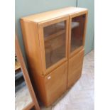 Two teak display cabinets