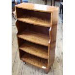 A bespoke miniature freestanding bookcase