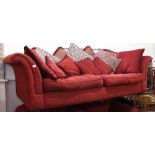 A large DFS dark red sofa with scatter cushion back