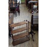 Four tier mahogany hanging shelves and a mahogany torchere