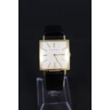 An 18ct gents square Girard Perregaux wristwatch on leather strap