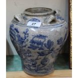 A bulbous 19th Century Chinese porcelain blue and white decorated crackle ware vase with four