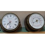 A quartz brass ships clock and barometer by Simpson Lawrence,