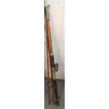 A four piece split cane fishing rod plus wood reel