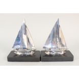 A pair of vintage chrome plated yacht bookends