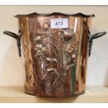 A WMF copper two handled planter with Art Nouveau relief floral decoration,