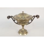 A 19th Century brass lidded urn with ivy leaf decoration