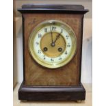An Edwardian inlaid mahogany mantel clock