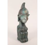 An African bronze kneeling figure,