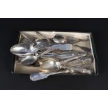 A quantity of silver spoons and forks, various dates and makers,