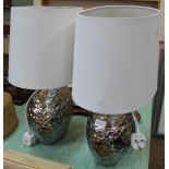 A pair of silvered pottery table lamps