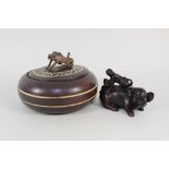 A Chinese pig and monkey group plus a wooden vessel with dragon finial