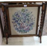 An oak barley twist woolwork fire screen