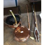 A 19th Century copper warming pan plus a coal helmet and contents