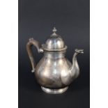 A silver teapot by Mappin & Webb London,