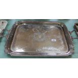 A silver plated two handled leaf engraved tea tray