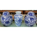 A large pair of modern Chinese blue and white floral ginger jars plus a landscape vase
