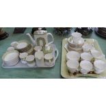 A Royal Doulton Sonnet part coffee set and a Royal Albert primrose part tea set