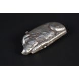 A silver pig vesta,