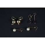 Two pairs of gold earrings,