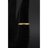 A 22ct gold band ring,