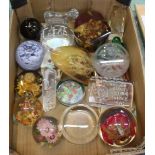 A box of various paperweights