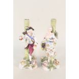 A pair of 19th Century Sitzendorf figural candlesticks,