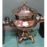 A Regency twin handled copper samovar with baluster body, brass tap,