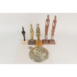 Egyptian and other standing metal figures plus a brass plaque of a military man