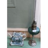 A Victorian chinoiserie teapot on stand plus a silver plated and blue glass oil lamp