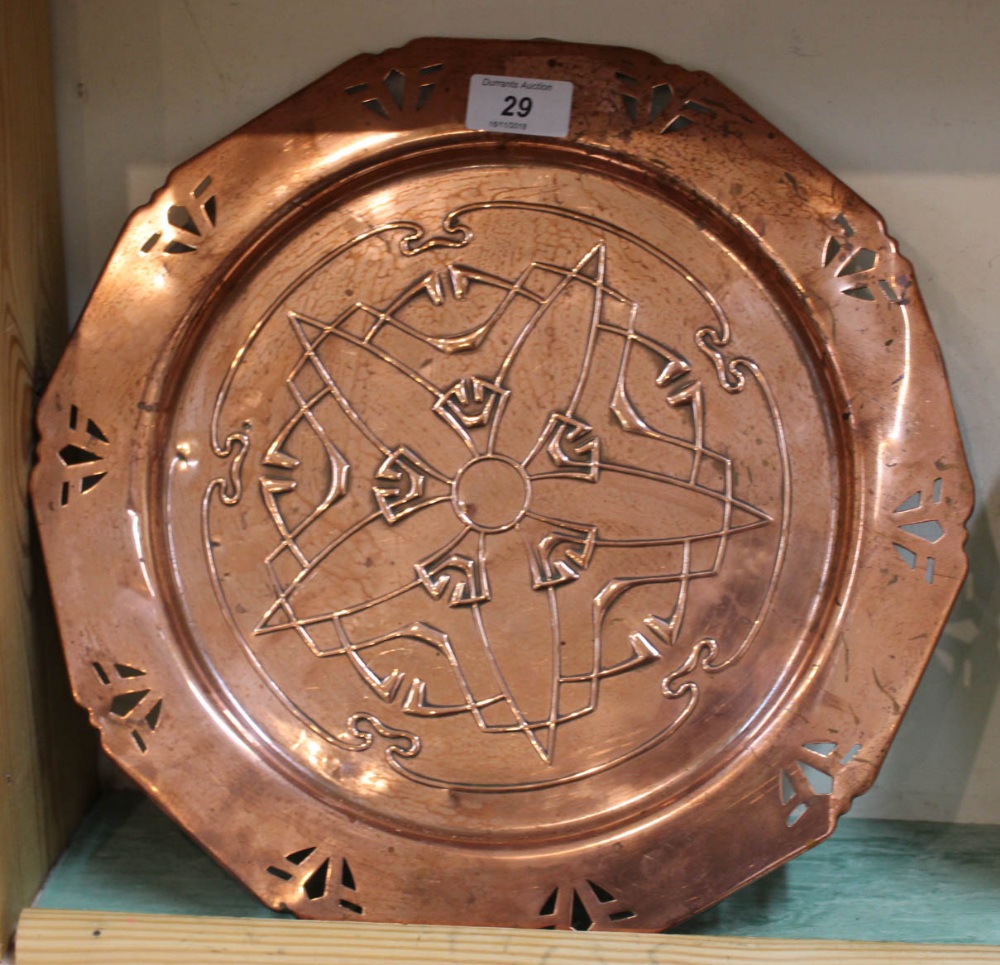 An Arts and Crafts copper pierced edge plate