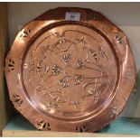 An Arts and Crafts copper pierced edge plate