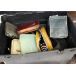 A Shakespeare top box containing reels, floats and lures including Winfield, Intrepid, Browning,