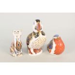 Two Royal Crown Derby bird paperweights plus a cat