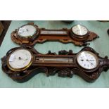 Two carved clock/barometer/thermometers (as found)