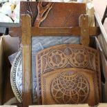 A carved wooden paper rack,