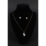 A 9ct gold opal and diamond set drop pendant on chain,